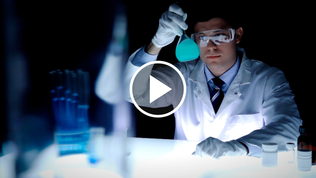 Scientist in laboratory. Click to view Corporate and Industrial videos.